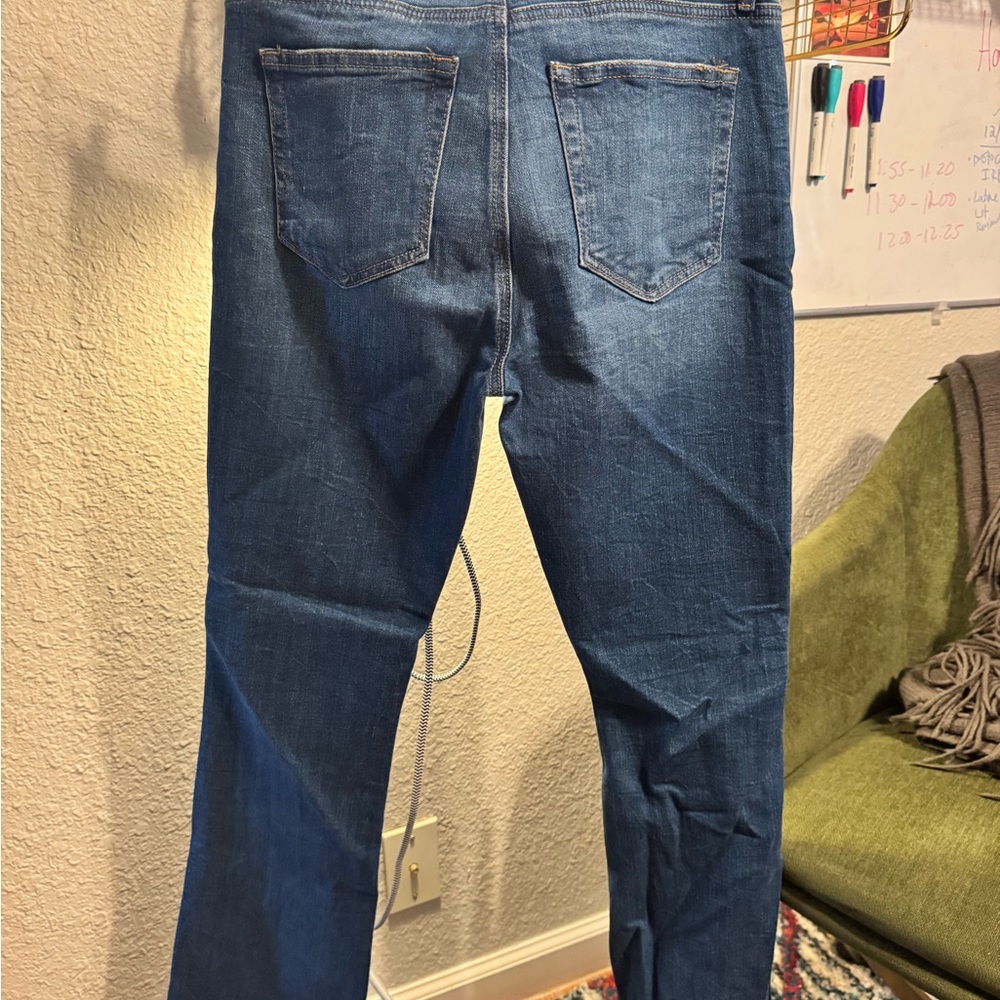 Loft Mid Rise Boot Jeans in Medium Stone Wash
Size 2